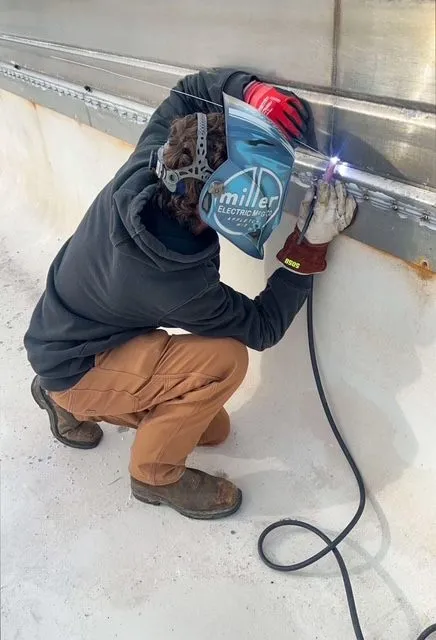 JTR crew member servicing a commercial pool